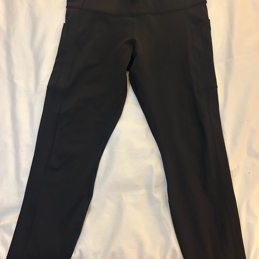 Athleta Black Ultimate Stash 7/8 Tight
